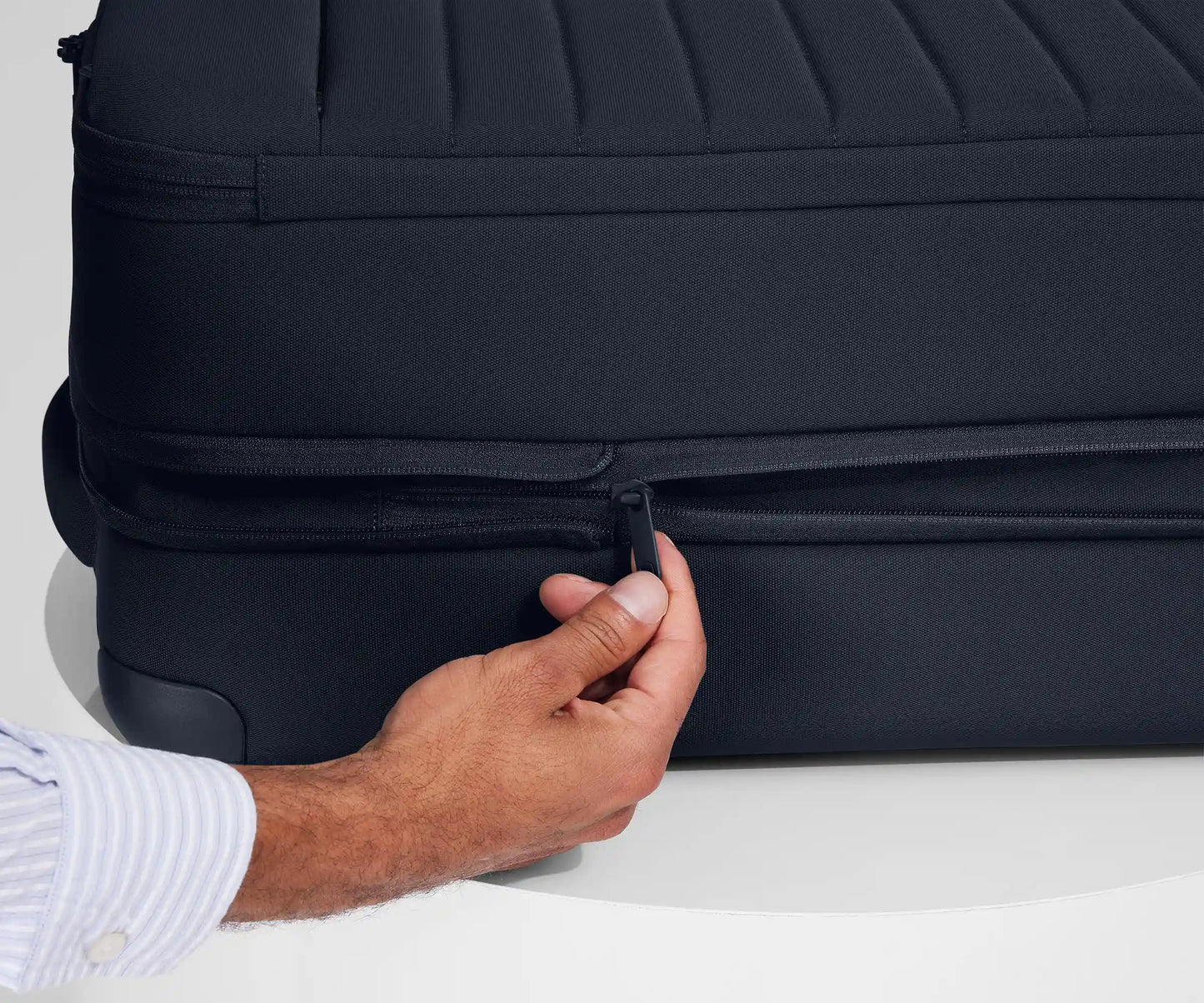 Softside Bigger Carry-On in Navy Blue