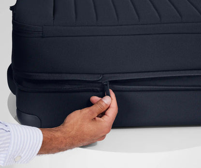 Softside Bigger Carry-On in Navy Blue