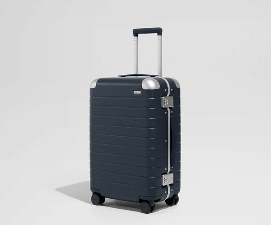 The Aluminum Edge Bigger Carry-On in Navy Blue